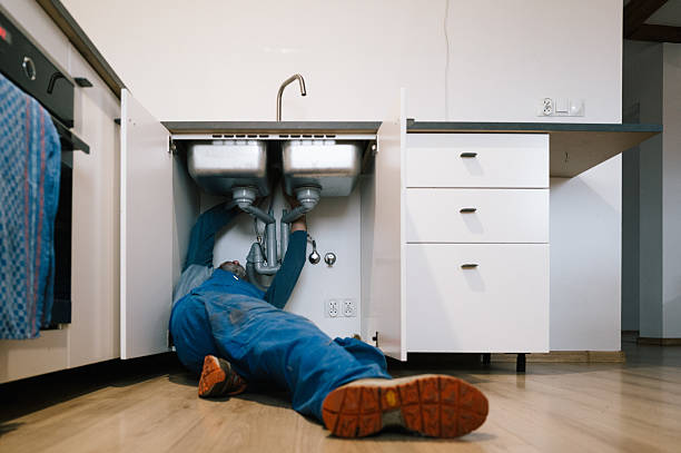 Professional Emergency Plumber technician working in Charm, OH